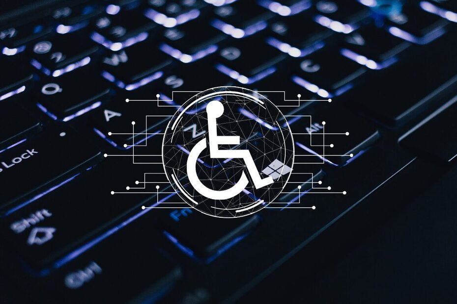 Eine Tastatur im Hintergrund und im Vordergrund ein Rollstuhlfahrer Piktogramm